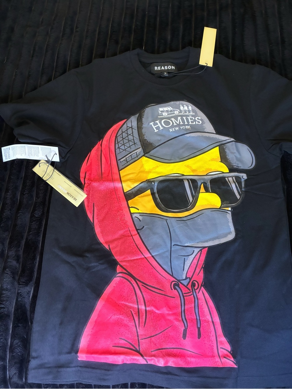 Reason Black Tee with Red Hoodie Graphic and Yellow Face